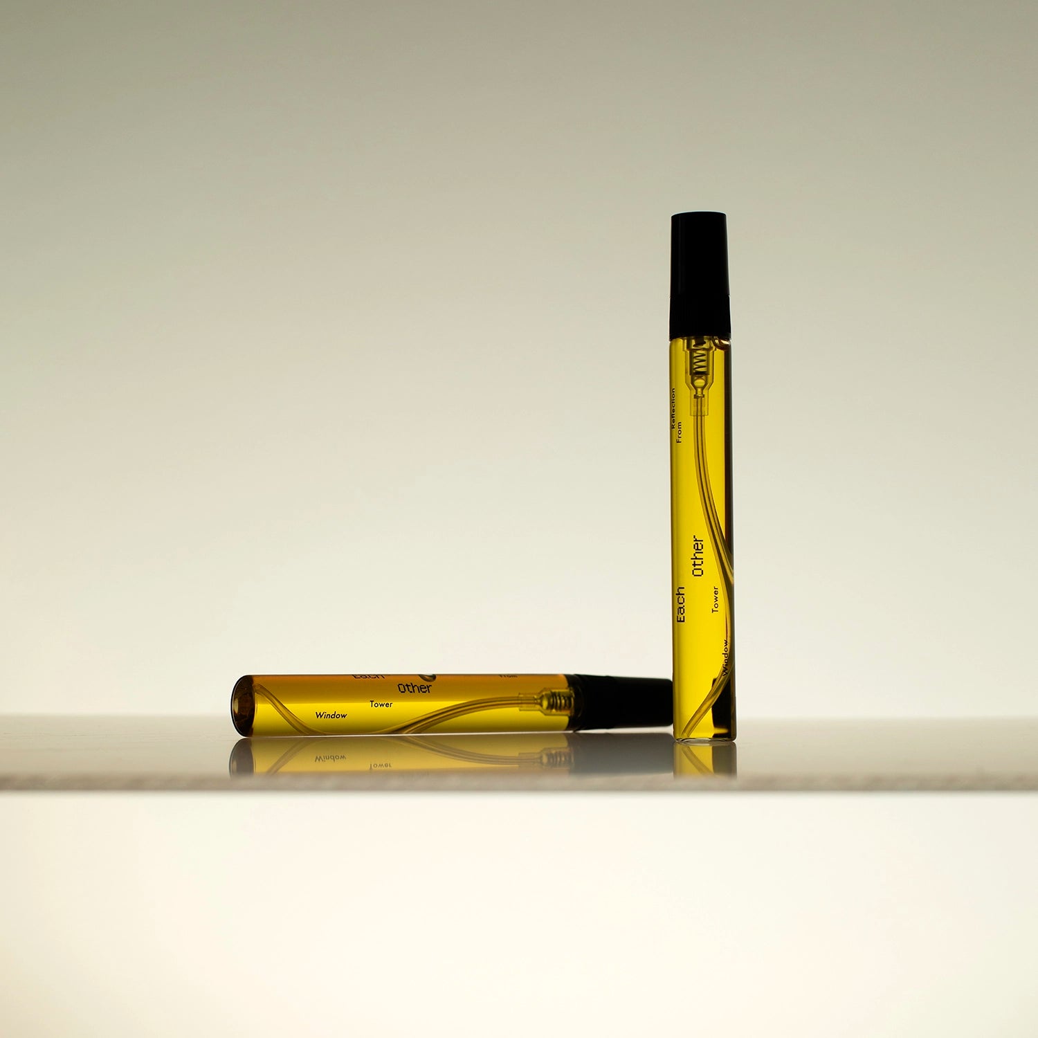 10ml vials of Blinding Reflection from Tower Window — genderless, 100% botanical perfume made with blood orange, yuzu, and vanilla.