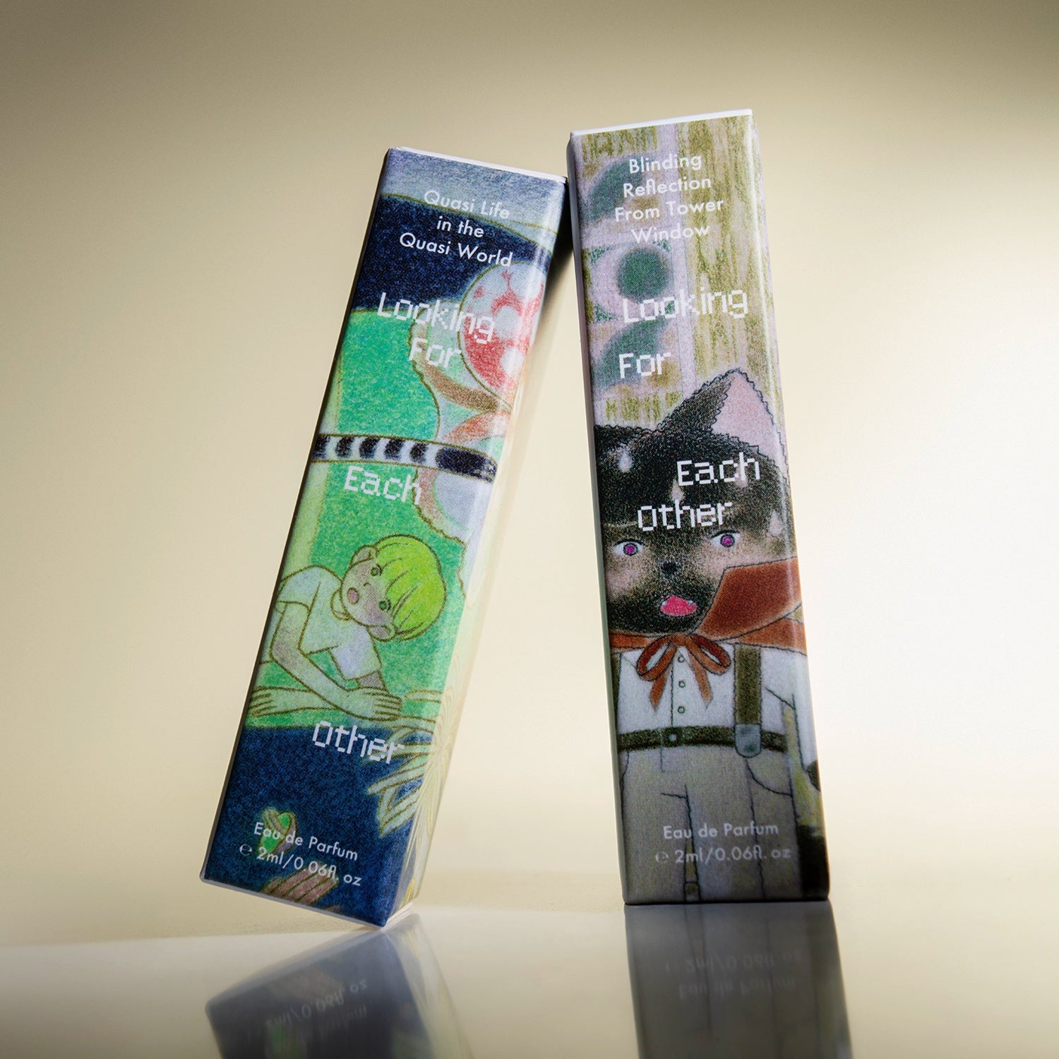 Looking For Each Other Discovery Duo — 2ml eau de parfum samples of Quasi Life in the Quasi World and Blinding Reflection From Tower Window, in illustrated mini boxes featuring whimsical art characters.